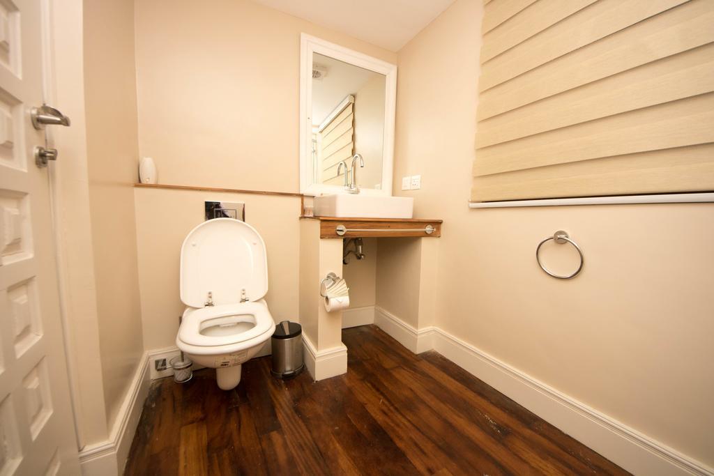 Olma Colonial Suites Acra Quarto foto