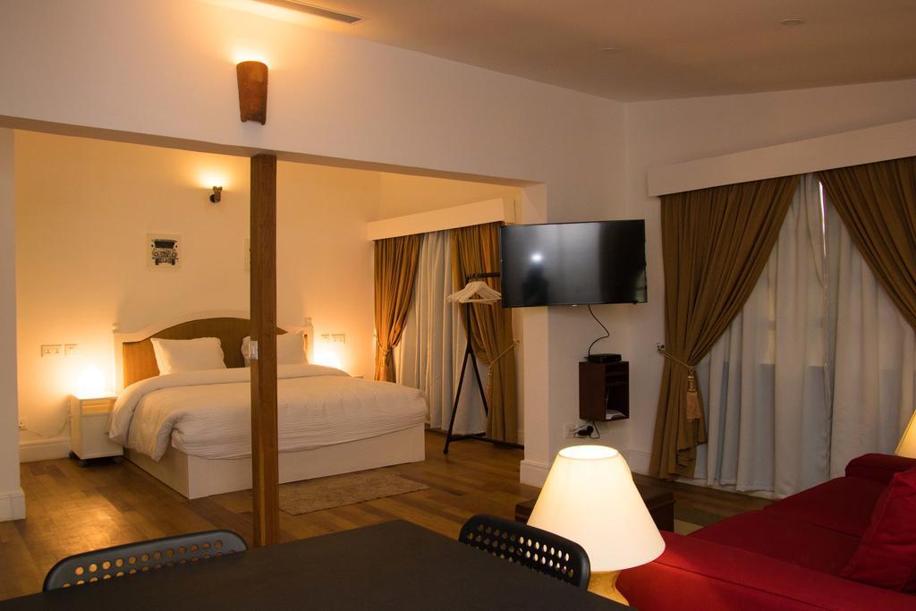 Olma Colonial Suites Acra Quarto foto